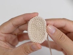 Detalhe oval da barriga em fio Banana